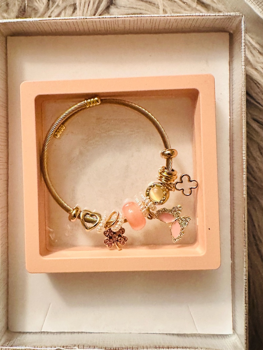 Gold-Tone Women's Charm Bangle Bracelet with Pink Accents